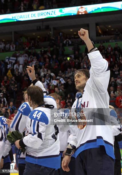 Teemu Selanne of Finland celebrates with his bronze medal after the ice hockey men's bronze medal game between Finland and Slovakia on day 16 of the...