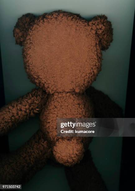 put teddy bear between photocopier,back view - kumacore stock pictures, royalty-free photos & images