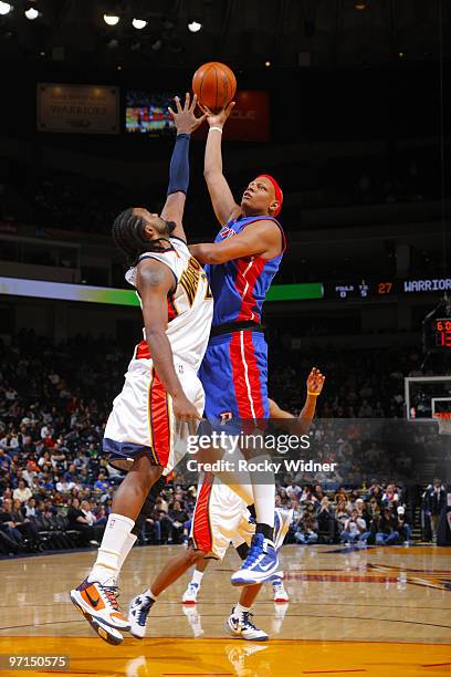 Charlie Villanueva of the Detroit Pistons attempts a hook shot against Ronny Turiaf of the Golden State Warriors on February 27, 2010 at Oracle Arena...