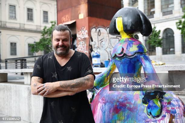 The artist Domingo Zapata restores his artwork, the menina 'La vida es sueno', in front of Queen Sofia Museum on June 11, 2018 in Madrid, Spain. This...