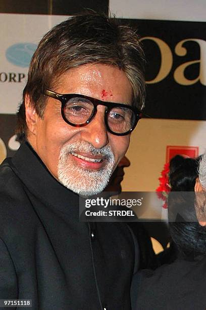 In this file photograph taken on December 3, 2009 Indian actor Amitabh Bachchan poses at the premiere of the Bollywood Hindi film �Paa� in Mumbai....