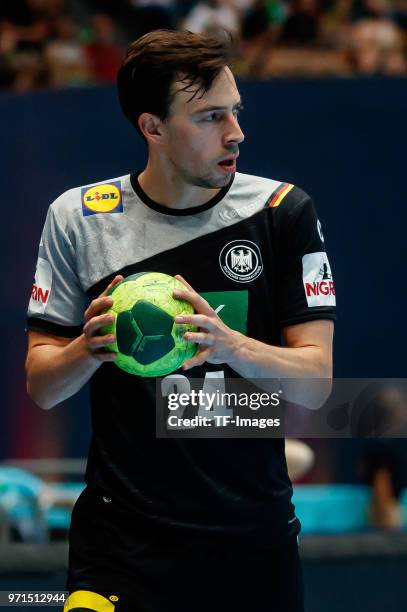 Patrick Groetzki of Germany controls the ball during the handball International friendly match between Germany and Norway at Olympiahalle on June 6,...