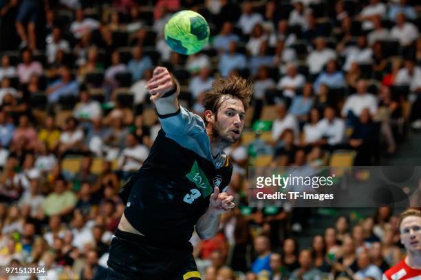 Hendrik Pekeler of Germany throws the ball during the handball International friendly match between Germany and Norway at Olympiahalle on June 6,...