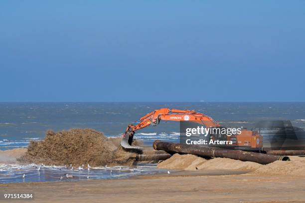 Hitachi Zaxis 470 LCH, crawler hydraulic excavator used by Dredging and Marine Works Jan De Nul for sand replenishment / beach nourishment at Ostend.