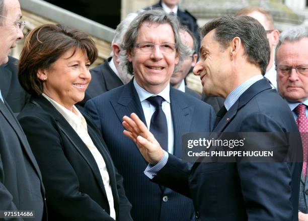 France's President Nicolas Sarkozy speaks with the mayor of Lille Martine Aubry who is also the campaign political advisor for the Socialist Party...