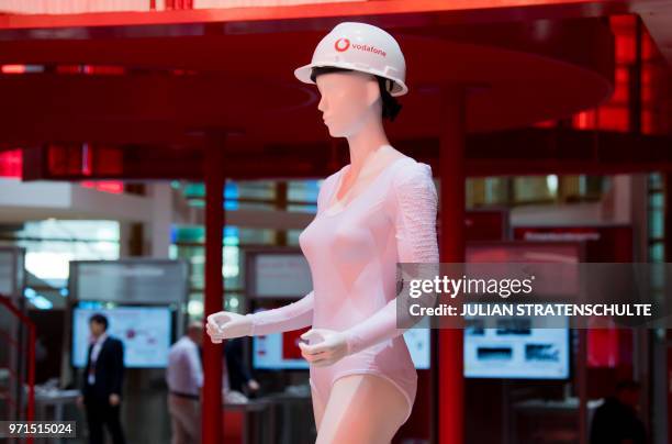 Mannequin with smart underwear for construction workers and a smart helmet stands at the Vodafone booth at the Cebit technology fair in Hanover,...