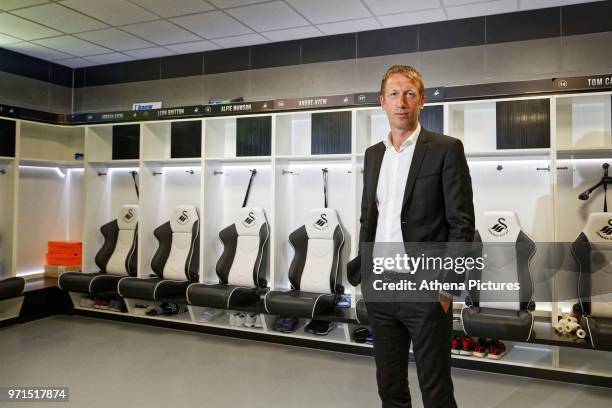 Graham Potter stands in the changing room during the unveiling of the new manager Graham Potter at The Fairwood Training Ground on June 11, 2018 in...