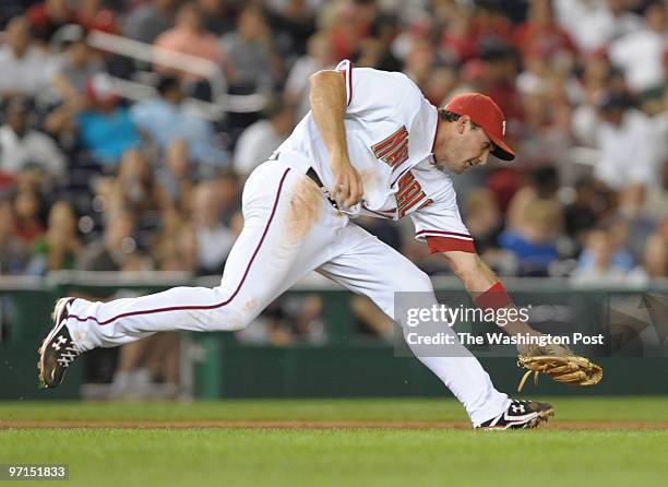 August 2009 CREDIT: Toni L. Sandys / TWP Washington, DC Nationals third baseman Ryan Zimmerman chases down a hit by Josh Whitesell during the game at...