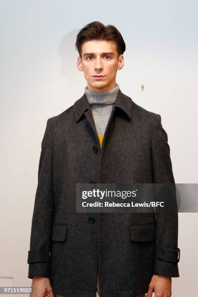 Model poses at the Mr Start presentation at the DiscoveryLAB during London Fashion Week Men's June 2018 at the BFC Show Space on June 11, 2018 in...