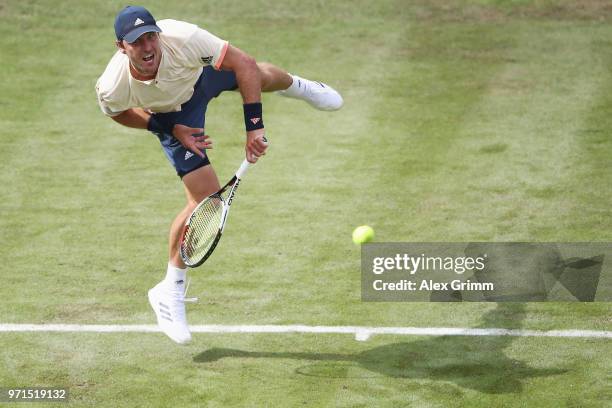 Mischa Zverev of Germany serves the ball to Mikhail Youzhny of Russia during day 1 of the Mercedes Cup at Tennisclub Weissenhof on June 11, 2018 in...