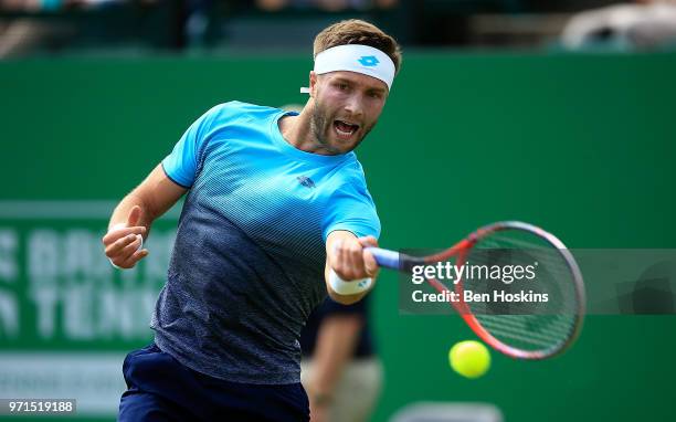 Liam Brody of Great Britain hits a forehand during his qualifying match against Alexander Ward of Great Britain on Day Three of the Nature Valley...