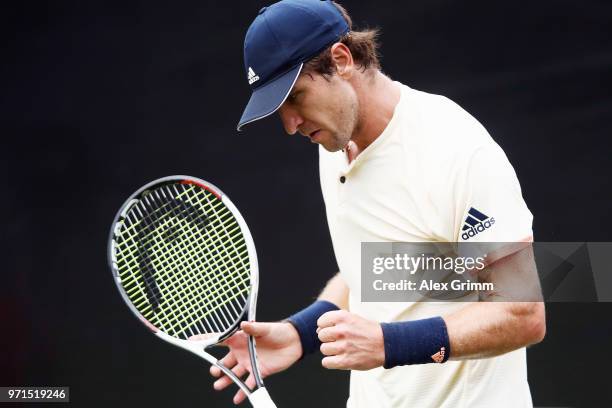 Mischa Zverev of Germany celebrates during his match against Mikhail Youzhny of Russia during day 1 of the Mercedes Cup at Tennisclub Weissenhof on...