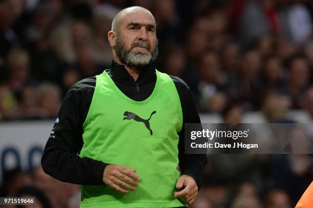 Eric Cantona warms-up during Soccer Aid for Unicef 2018 at Old Trafford on June 10, 2018 in Manchester, England at Old Trafford on June 10, 2018 in...