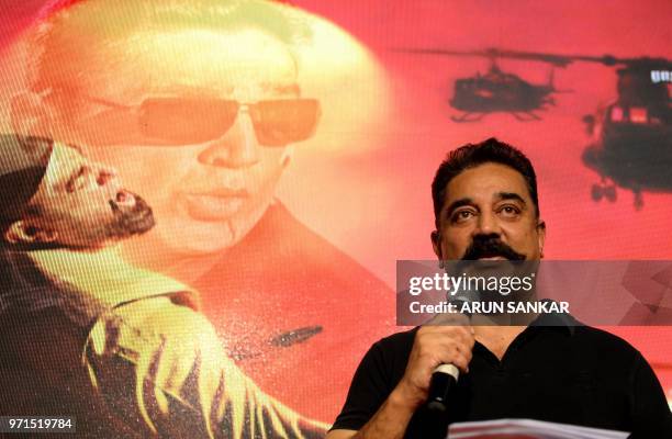 Indian Bollywood star Kamal Hassan addresses the launch of the trailer of the upcoming movie 'Vishwaroop' in Chennai on June 11, 2018.