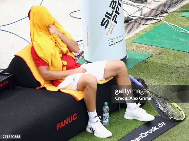 Mikhail Youzhny of Russia reacts during his match against Mischa Zverev of Germany during day 1 of the Mercedes Cup at Tennisclub Weissenhof on June...