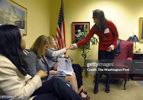 Street NW, Washington, DC. 15 accomplished women "speed mentor" 45 up-and-comers looking for advice. Maria Cardona greets her Minute Mentoring group....