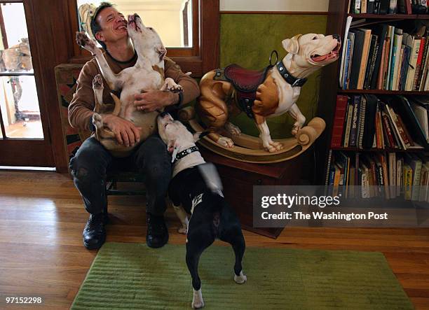 VickDogsChapterTwo16 DATE: April 5, 2008 CREDIT: Carol Guzy/ The Washington Post LOCATION: Oakland CA CAPTION: VICK DOGS a year later. Tim Racer, is...