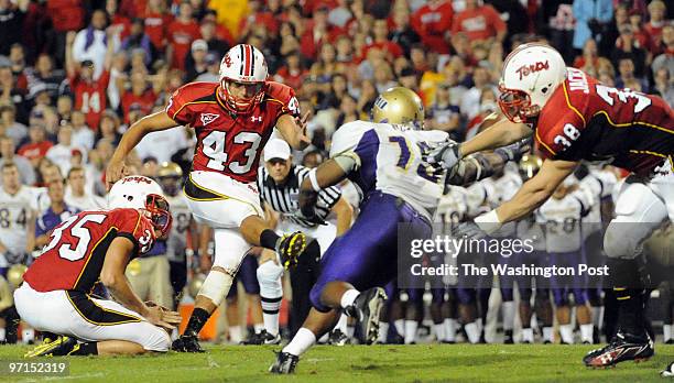 Maryland's football home opener vs. James Madison. Maryland's Nick Ferrara makes the winning overtime kick to beat JMU 38-35. Holder is Travis Baltz.