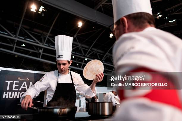 Hungary's Adam Pohner competes during the Europe 2018 Bocuse d'Or International culinary competition on June 11, 2018 in Turin.