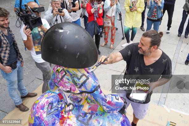 The artist Domingo Zapata restores his artwork, the menina 'La vida es sueno', in front of Queen Sofia Museum on June 11, 2018 in Madrid, Spain. This...