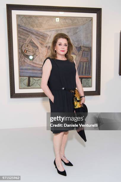 Catherine Deneuve attends Wilfredo Lam 'Nouveau Nouveau Monde' Exhibition Opening Hosted by the Lam Family at Galerie Gmurzynska on June 9, 2018 in...