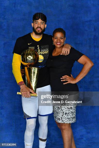 JaVale McGee of the Golden State Warriors poses for a portrait with his mother and Former WNBA player, Pamela McGee and the Larry O'Brien Trophy...