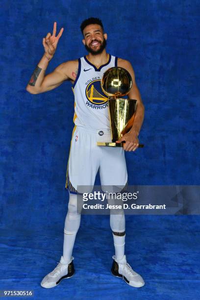 JaVale McGee of the Golden State Warriors poses for a portrait with the Larry O'Brien Trophy after winning Game Four of the 2018 NBA Finals against...