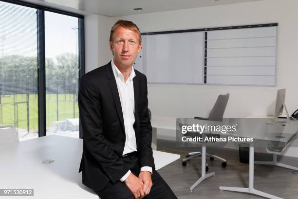 Graham Potter sits in his office during the unveiling of the new manager Graham Potter at The Fairwood Training Ground on June 11, 2018 in Swansea,...