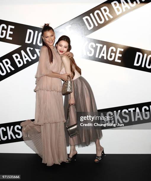 Face of Dior Make-up Bella Hadid and K-Pop singer Sun-mi attend the Dior Backstage launch party at EDIT on June 11, 2018 in Seoul, South Korea.