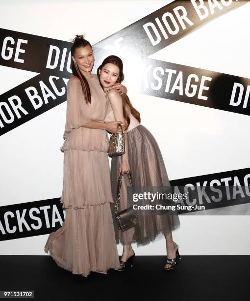 Face of Dior Make-up Bella Hadid and K-Pop singer Sun-mi attend the Dior Backstage launch party at EDIT on June 11, 2018 in Seoul, South Korea.