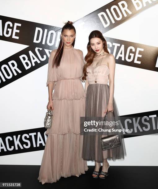 Face of Dior Make-up Bella Hadid and K-Pop singer Sun-mi attend the Dior Backstage launch party at EDIT on June 11, 2018 in Seoul, South Korea.