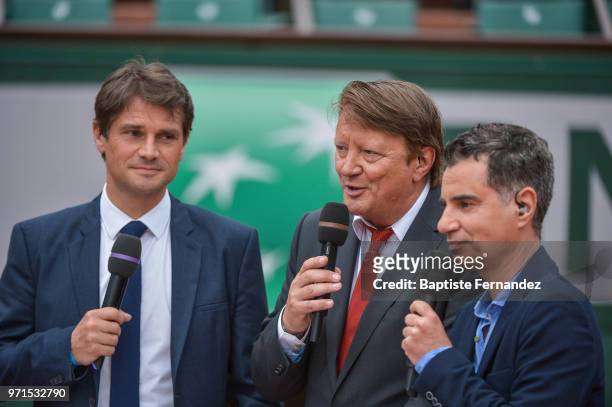 Journalist Arnaud Boetsch, Lionel Chamoulaud and Laurent Luyat during Day 15 for the French Open 2018 on June 10, 2018 in Paris, France.
