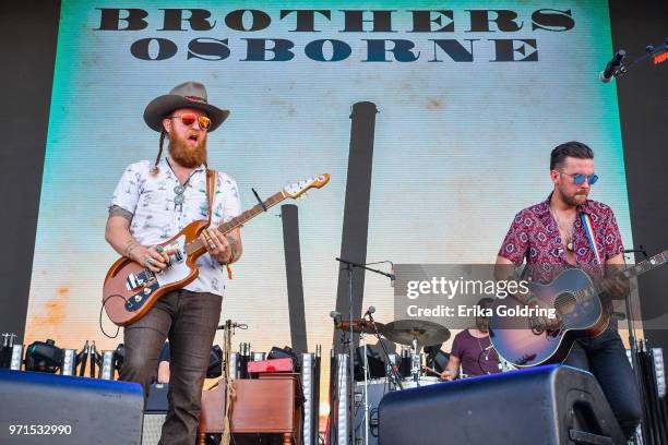 John Osborne and T.J. Osborne of Brothers Osborne perform during Bonnaroo Music & Arts Festival on J