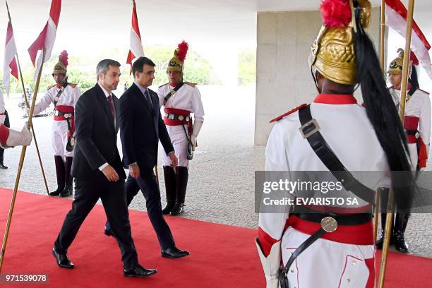 Paraguay's President-elect Mario Abdo Benitez arrives at Planalto Palace in Brasilia for a meeting with Brazil's President Michel Temer on June 11,...