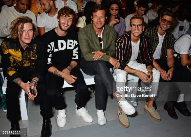 Dougie Poynter, Cody Saintgnue, Paul Sculfor, Oliver Proudlock and Darren Kennedy attend the What We Wear show during London Fashion Week Men's June...