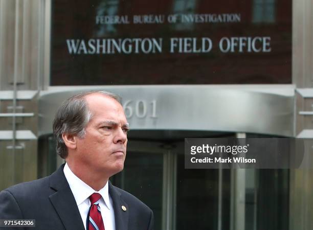 James Wolfe, former director of security for the Senate Intelligence Committee, walks out from the Washington FBI Field Office after being processed...