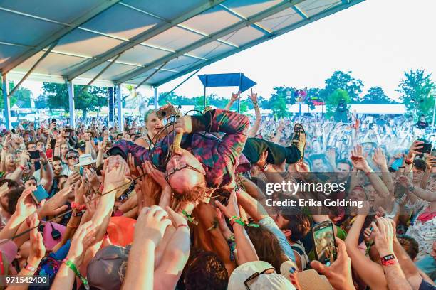 Paul Janeway of St. Paul and The Broken Bones crowdsurfs during Bonnaroo Music & Arts Festival on June 10 in Manchester, Tennessee.