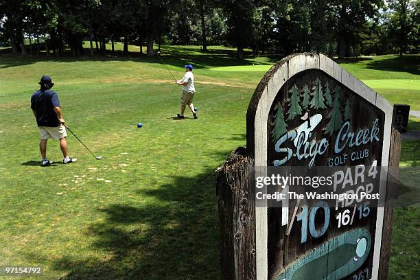 Me-publicgolf DATE:July 18, 2009 CREDIT: Mark Gail/TWP Silver Spring, Md ASSIGNMENT#:208871 EDITED BY:mg James M Greene watched as golf partner Eric...