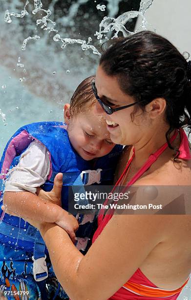 July 14,2009 Splashdown Park, 7500 Ben Lomond Park Drive, Manassas, VA Families enjoying Splashdown Park, Manassas, VA. Laura Andrews holding her son...