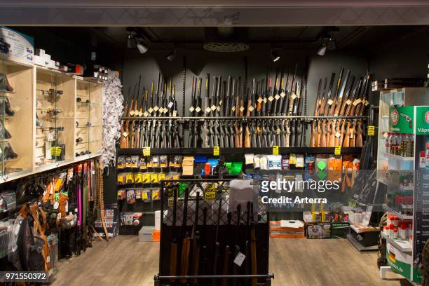 Interior of gunstore selling rifles, handguns and other firearms at Longyearbyen, Svalbard / Spitsbergen, Norway.
