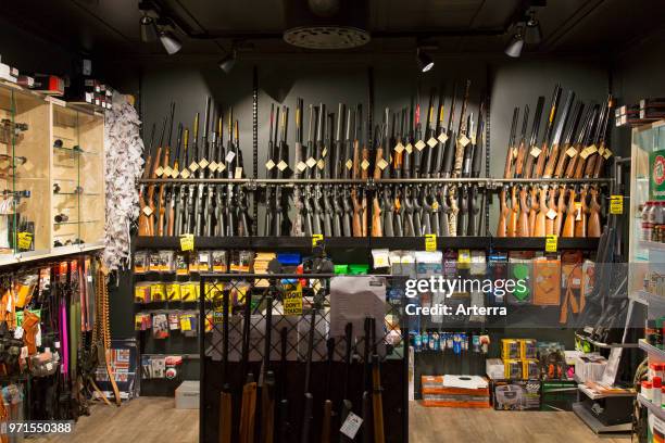 Interior of gunstore selling rifles, handguns and other firearms at Longyearbyen, Svalbard / Spitsbergen, Norway.