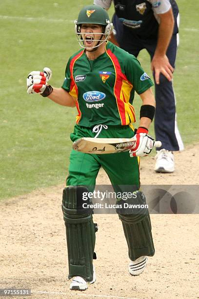 Tim Paine of the Tigers celebrates his century during the Ford Ranger Cup Final match between the Victorian Bushrangers and the Tasmanian Tigers at...