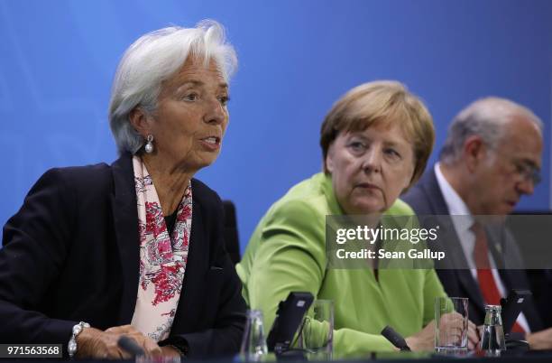 German Chancellor Angela Merkel and International Monetary Fund head Christine Lagarde attend a press conference following talks at the Chancellery...