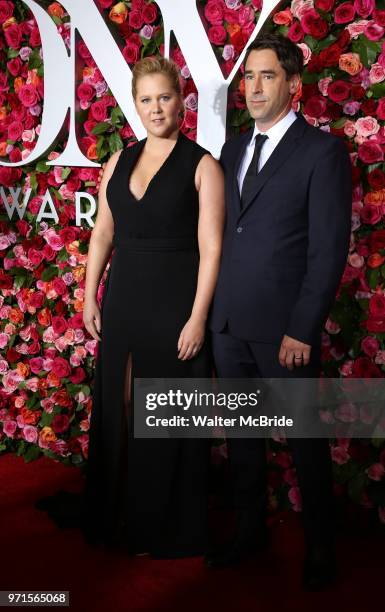 Amy Schumer and Chris Fischer attend the 72nd Annual Tony Awards on June 10, 2018 at Radio City Music Hall in New York City.