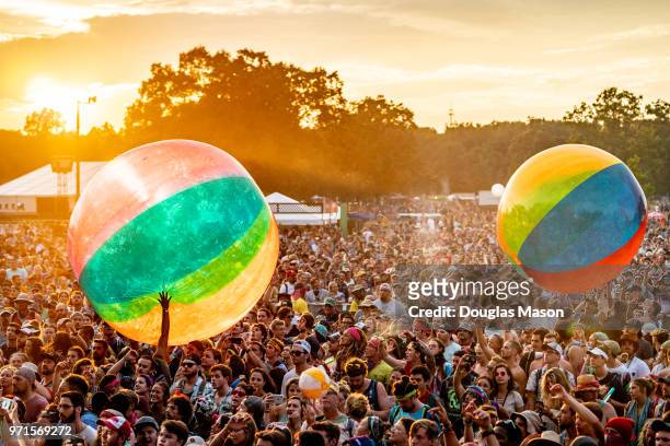 The crowd plays with giant beach balls while Moon Taxi performs during the Bonnaroo Music and Arts Festival 2018 on June 10, 2018 in Manchester,...