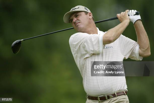 Neal Lancaster hits off the fifth tee during the third round of the Advil Western Open July 6, 2002 at Cog Hill Golf and Country Club in Lemont,...