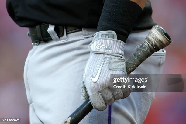 Detail of the Nike batting glove worn by Tony Wolters of the Colorado Rockies during the game against the Cincinnati Reds at Great American Ball Park...