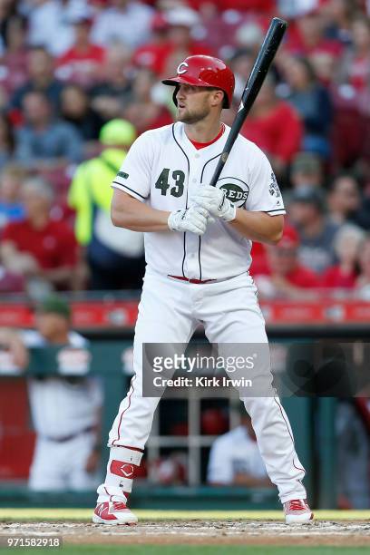 Scott Schebler of the Cincinnati Reds takes an at bat during the game against the Colorado Rockies at Great American Ball Park on June 6, 2018 in...