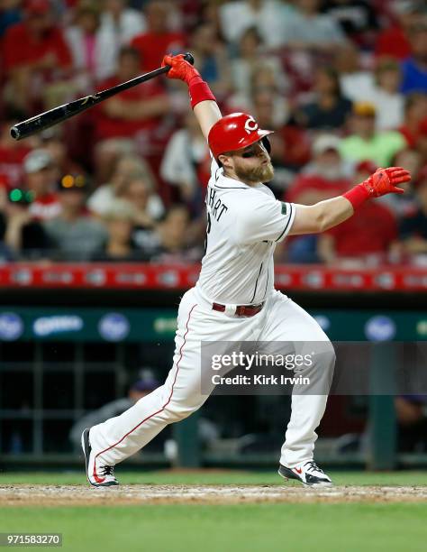 Tucker Barnhart of the Cincinnati Reds takes an at bat during the game against the Colorado Rockies at Great American Ball Park on June 6, 2018 in...