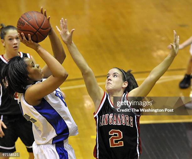 Sp-mdgirls13 DATE:March 12, 2009 CREDIT: Mark Gail/TWP Catonsville, Md. ASSIGNMENT#:206757 EDITED BY: mg Blake's Faye Dunston looked to shoot over...